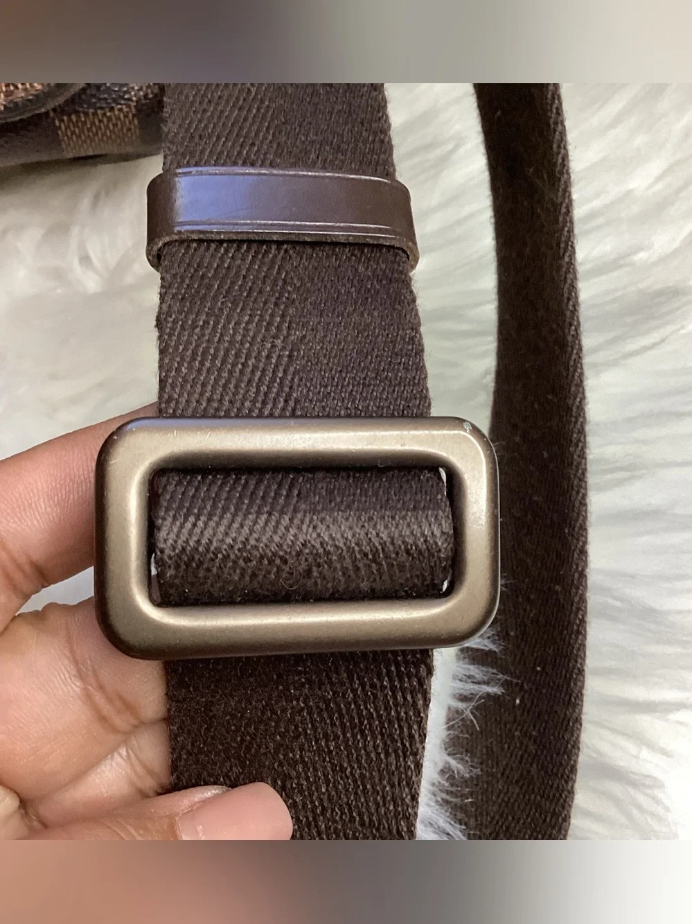 Louis Vuitton Damier Ebene District MM messenger bag.